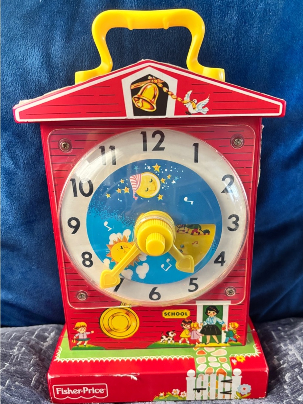 Fisher-Price Red and Yellow Teaching Clock with Blue Face